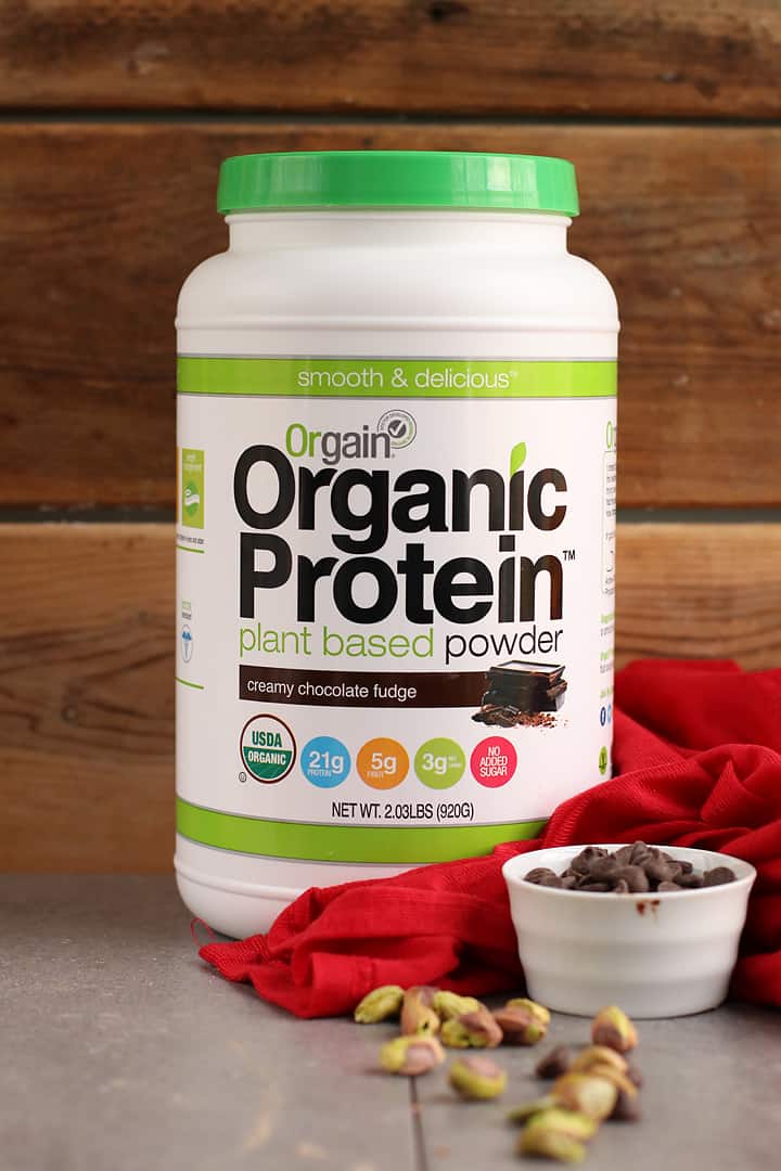 Tub of Orgain Chocolate Protein Powder