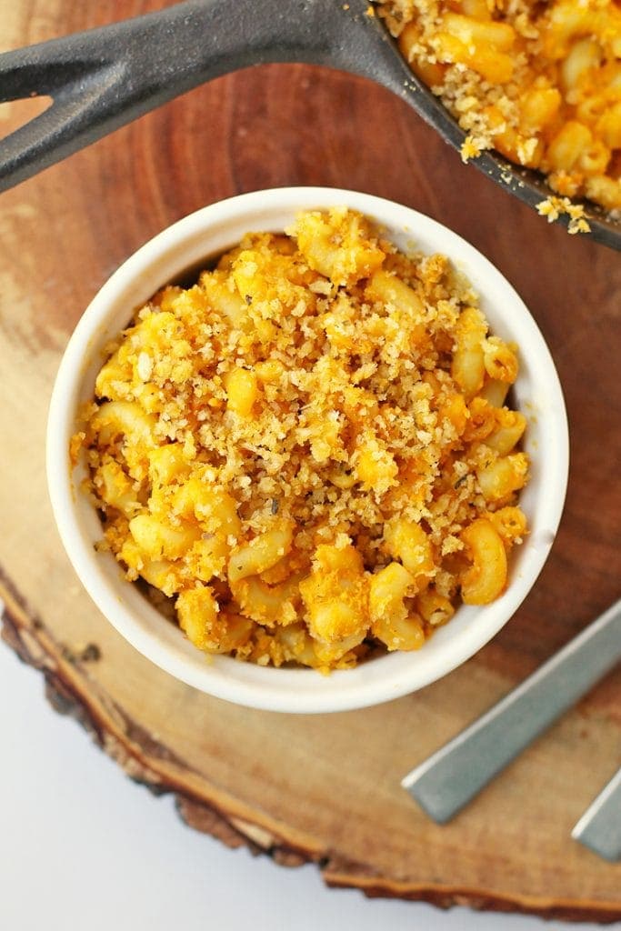 Baked Mac and Cheese in a white bowl with a fork