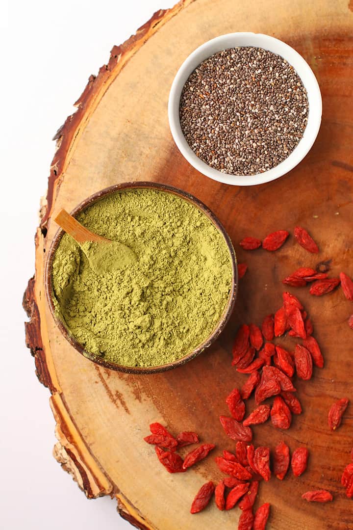 Matcha powder, chia seeds, and goji berries