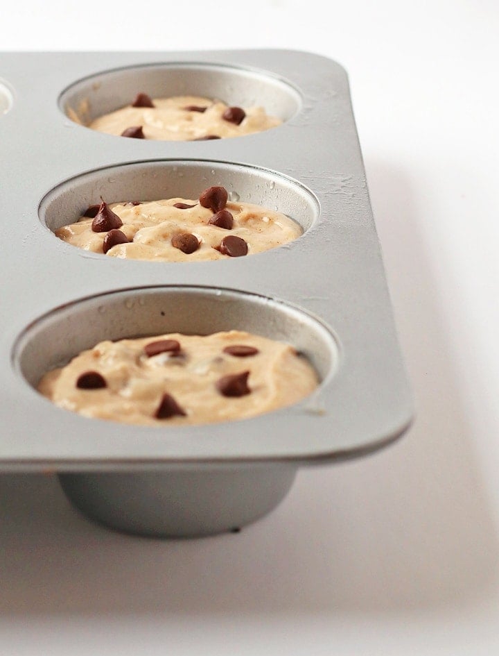 Chocolate Chip Muffin batter in muffin tin