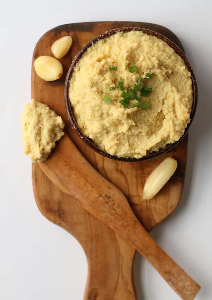 Vegan Cashew Ricotta in a small bowl on a wooden board