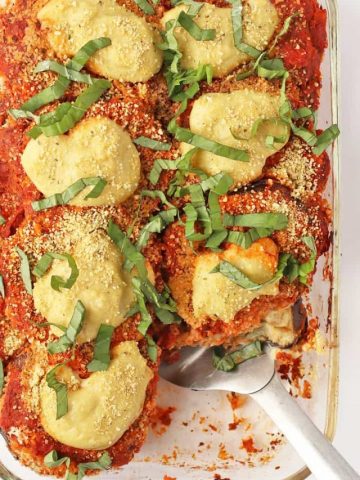 Finished recipe in a casserole dish with a metal spatula