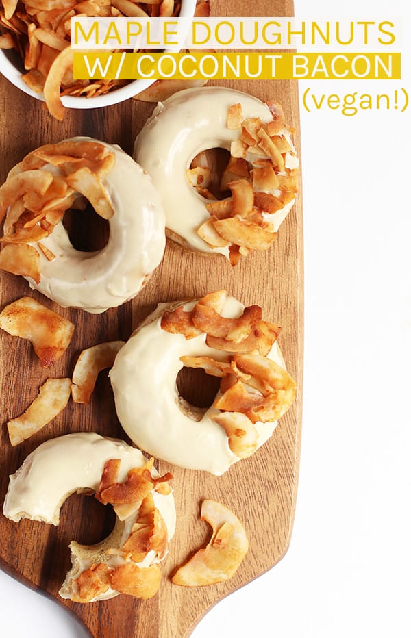 These vegan Maple Bacon Doughnuts are lightly baked and finished with a sweet maple glaze and crispy coconut bacon for a delicious morning pastry. #vegan #doughnuts #vegandoughnuts #fallrecipes #baking #coconutbacon #mydarlingvegan