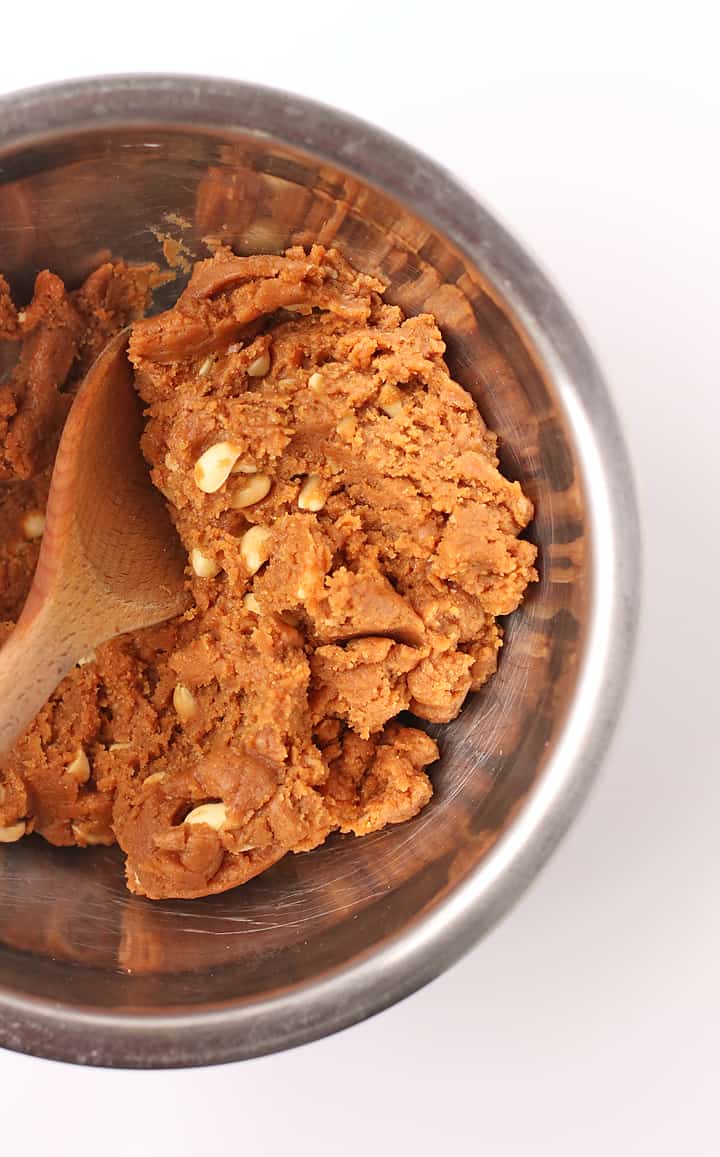 Peanut butter cookie dough in a metal bowl