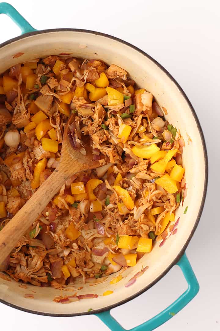 Onions, peppers, and jackfruit in a large soup pot