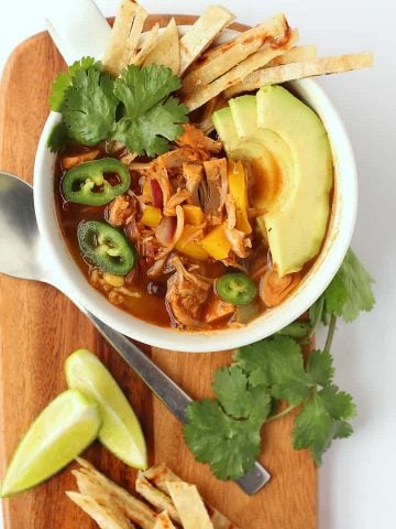 Finished soup with jalapeños, avocado, and cilantro