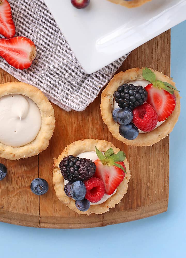 Fresh fruit tarts with strawberries, blackberries, and blueberries