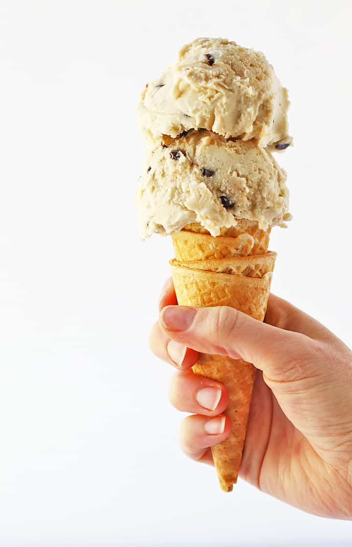 Two scoops of cookie dough ice cream in an ice cream cone