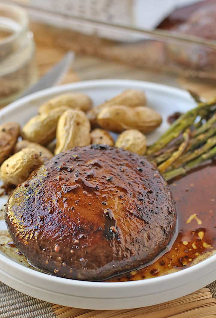 Finished dish served with asparagus and potatoes