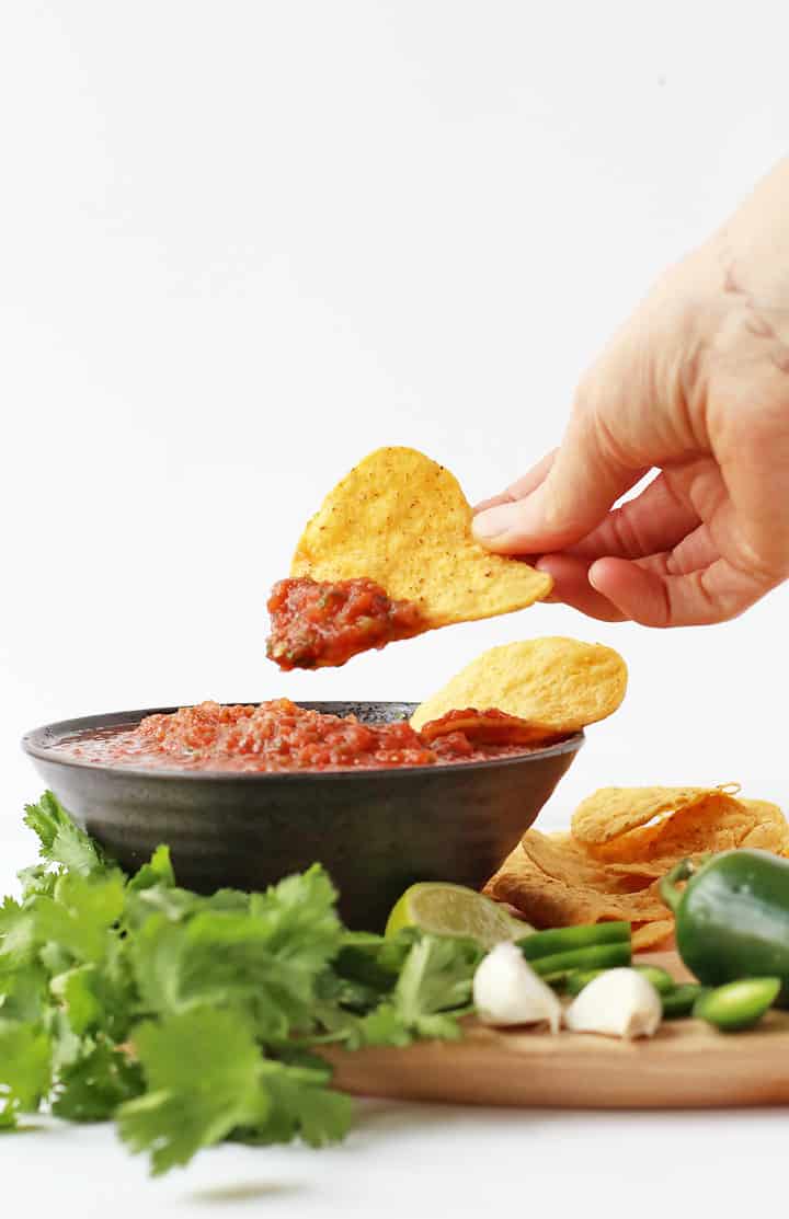 Finished recipe in a brown bowl with tortilla chips