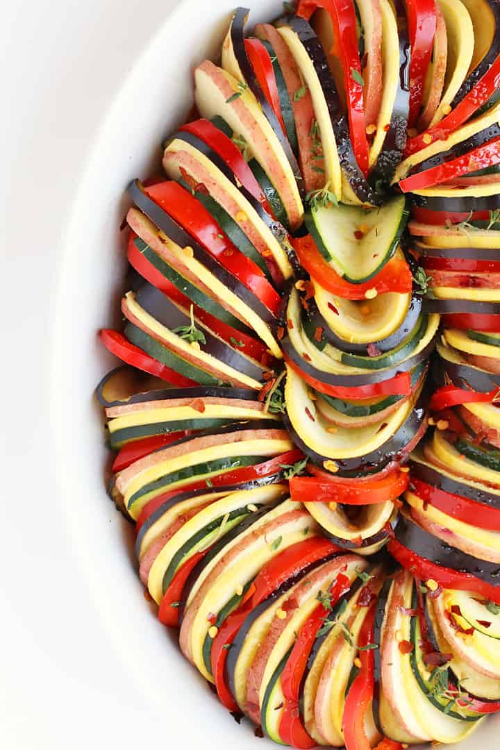 Thinly sliced vegetables spiraled into a baking dish