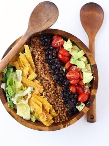 Finished salad in a wooden salad bowl