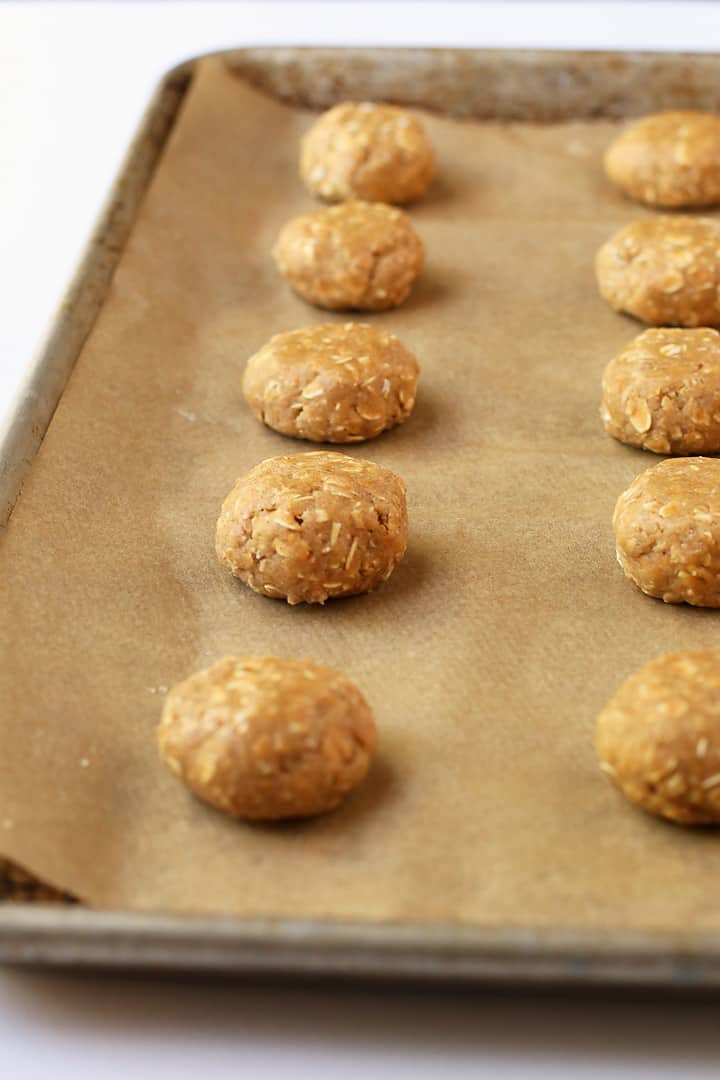 Oatmeal cookie dough on a baking sheet