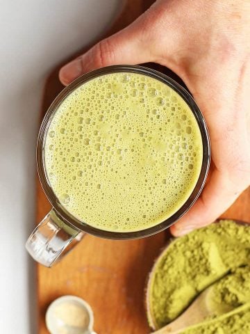 Homemade Matcha Latte on a wooden board