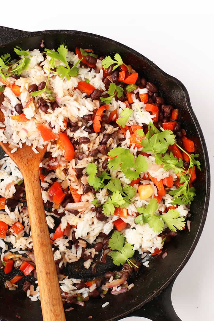 Black beans and rice in a large cast iron skillet