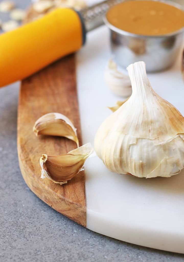 Fresh garlic on a cutting board.