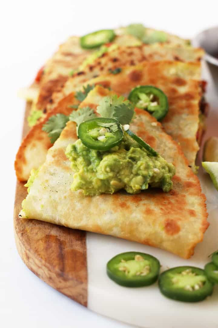 Stack of vegan quesadillas.