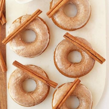 Finished donuts on a marble platter