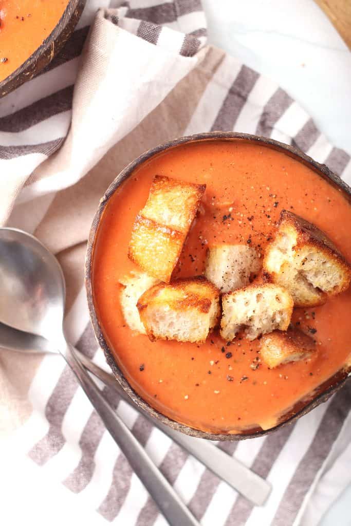 Bowl of vegan tomato soup with homemade croutons. 