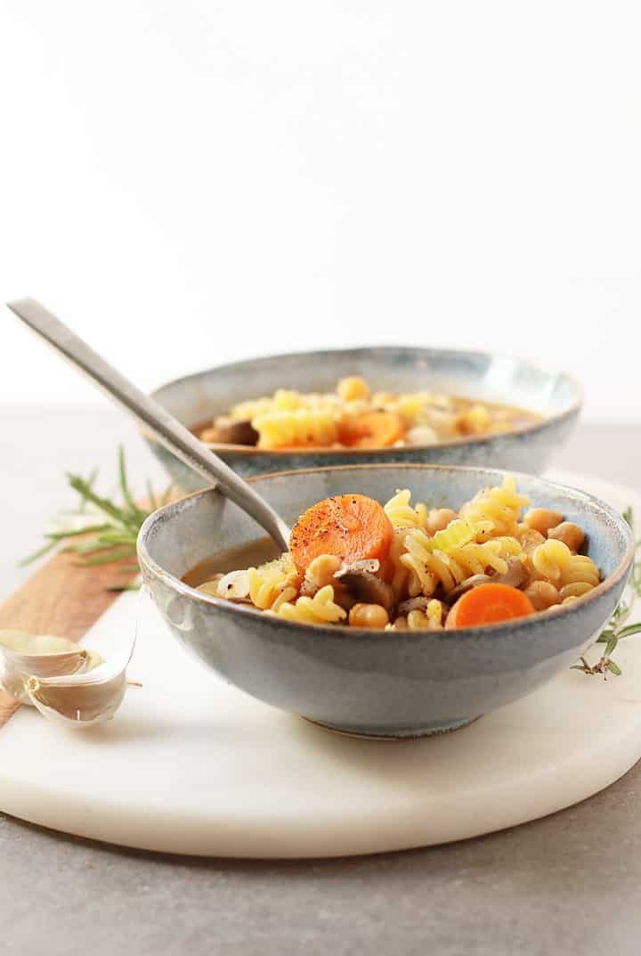 Vegetable noodle soup served into two bowls