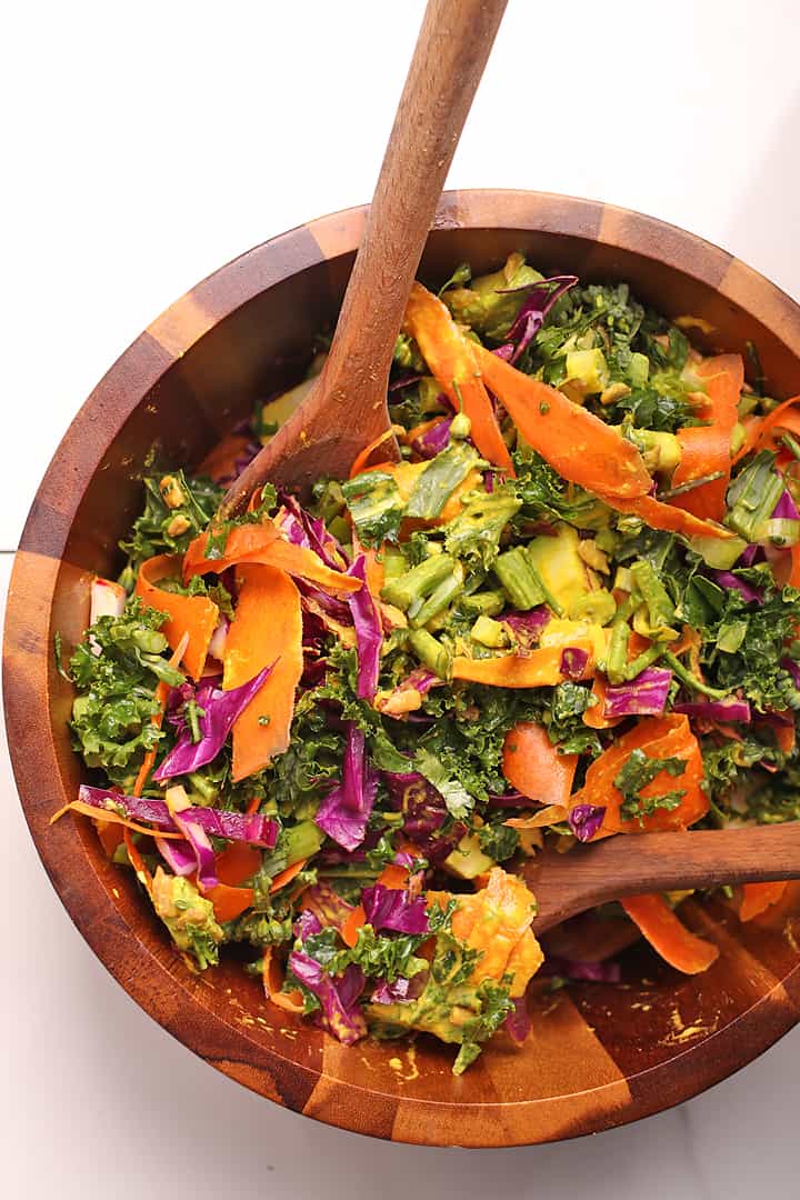 Finished salad in a wooden salad bowl