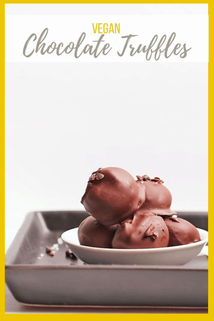 Make your Christmas chocolates at home with this simple 3-ingredient Vegan Chocolate Truffle recipe. A rich and decadent chocolate ganache base covered in a crisp chocolate coating, these truffles make the perfect DIY holiday gift. 