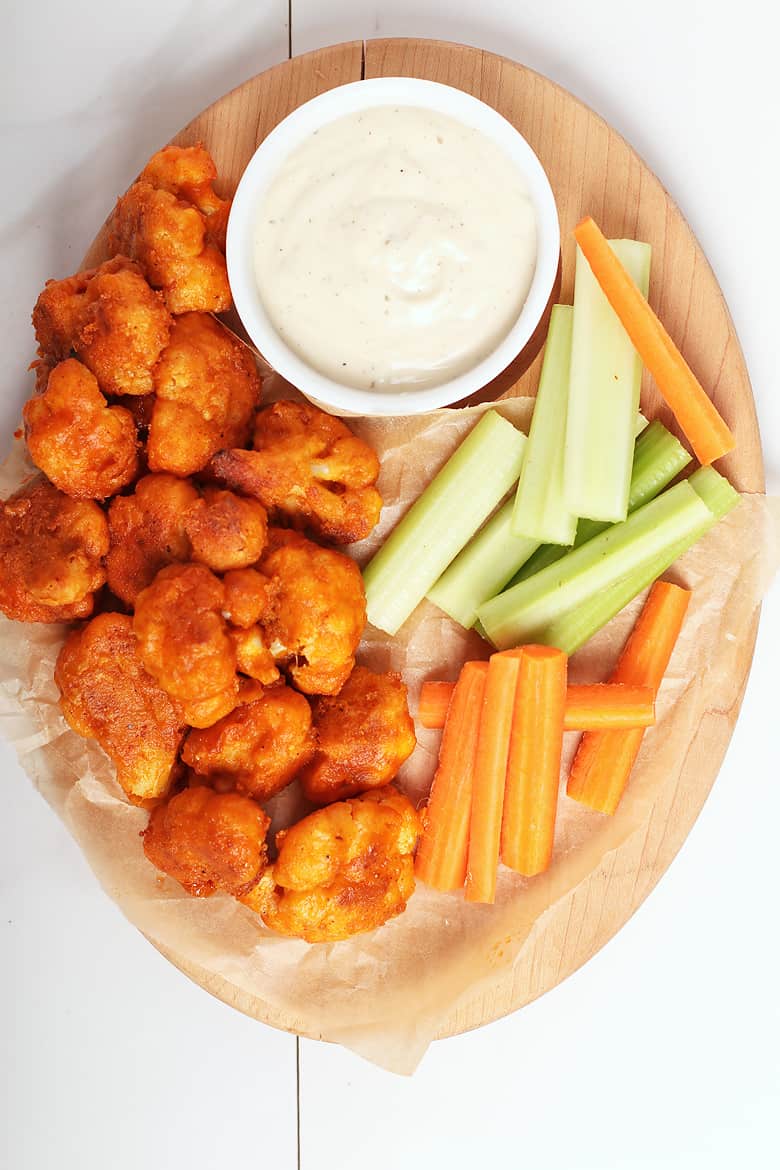 Buffalo Cauliflower Wings with ranch and carrot sticks