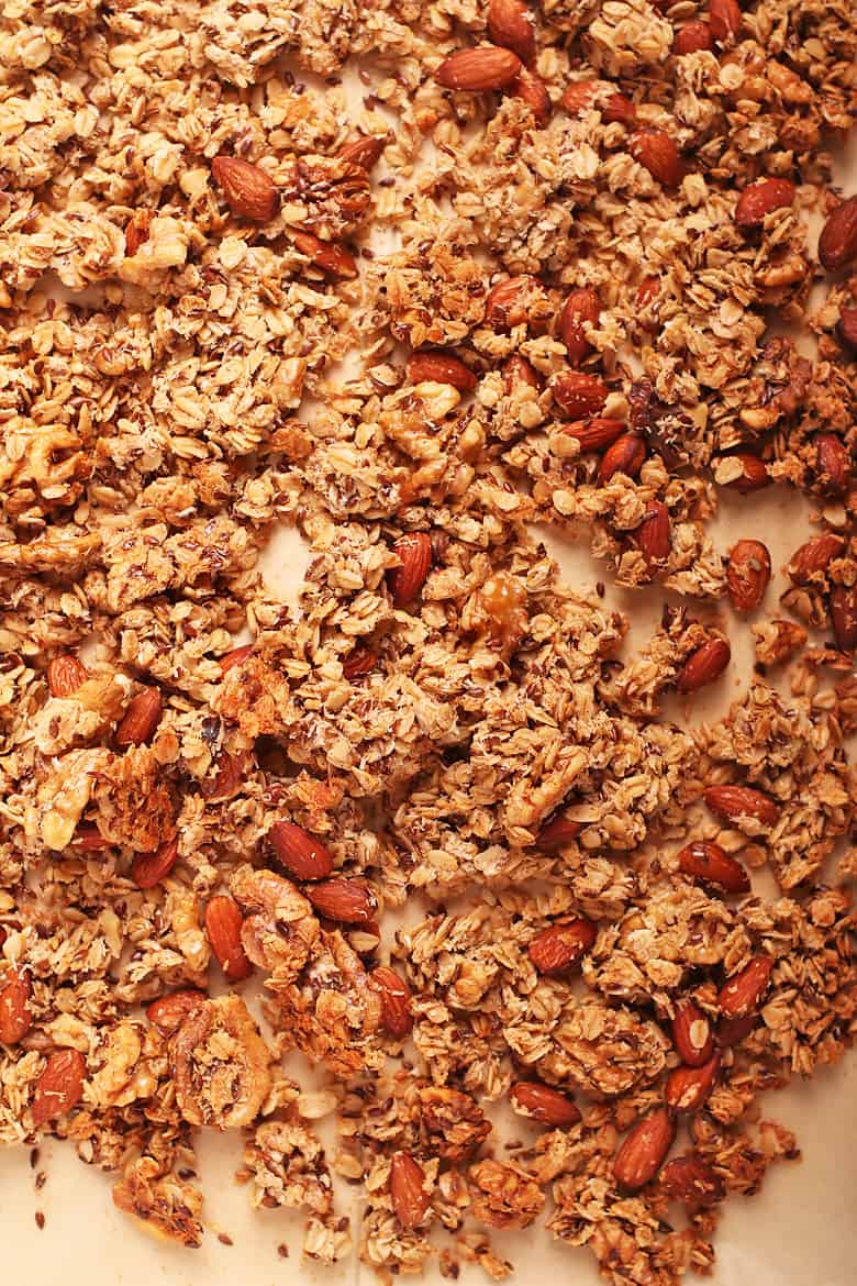 Baked homemade granola on a baking sheet