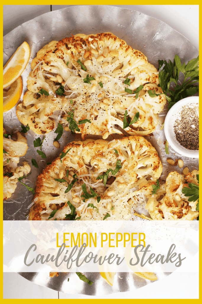 Impress all your friends with this vegan baked Lemon Pepper Cauliflower Steaks. A tender and creamy steak topped with fresh parsley, toasted pine nuts, and non-dairy parmesan cheese.