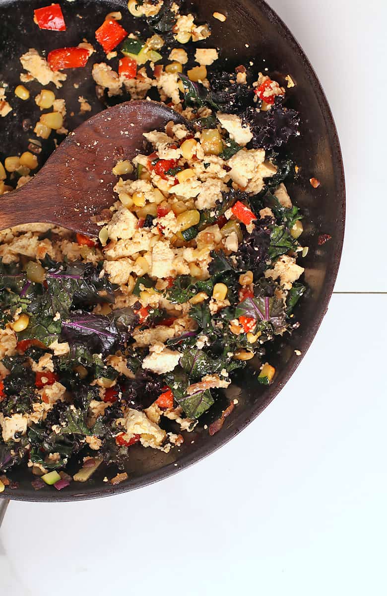 Sautéed vegetables and tofu in a skillet