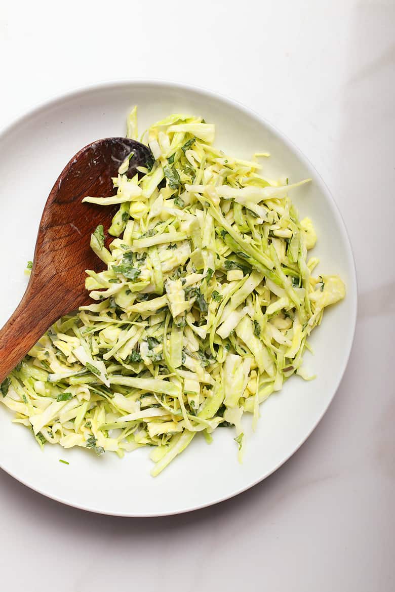 Vegan Cabbage Slaw in a white bowl