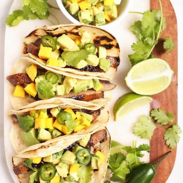 Mushroom tacos on a white board