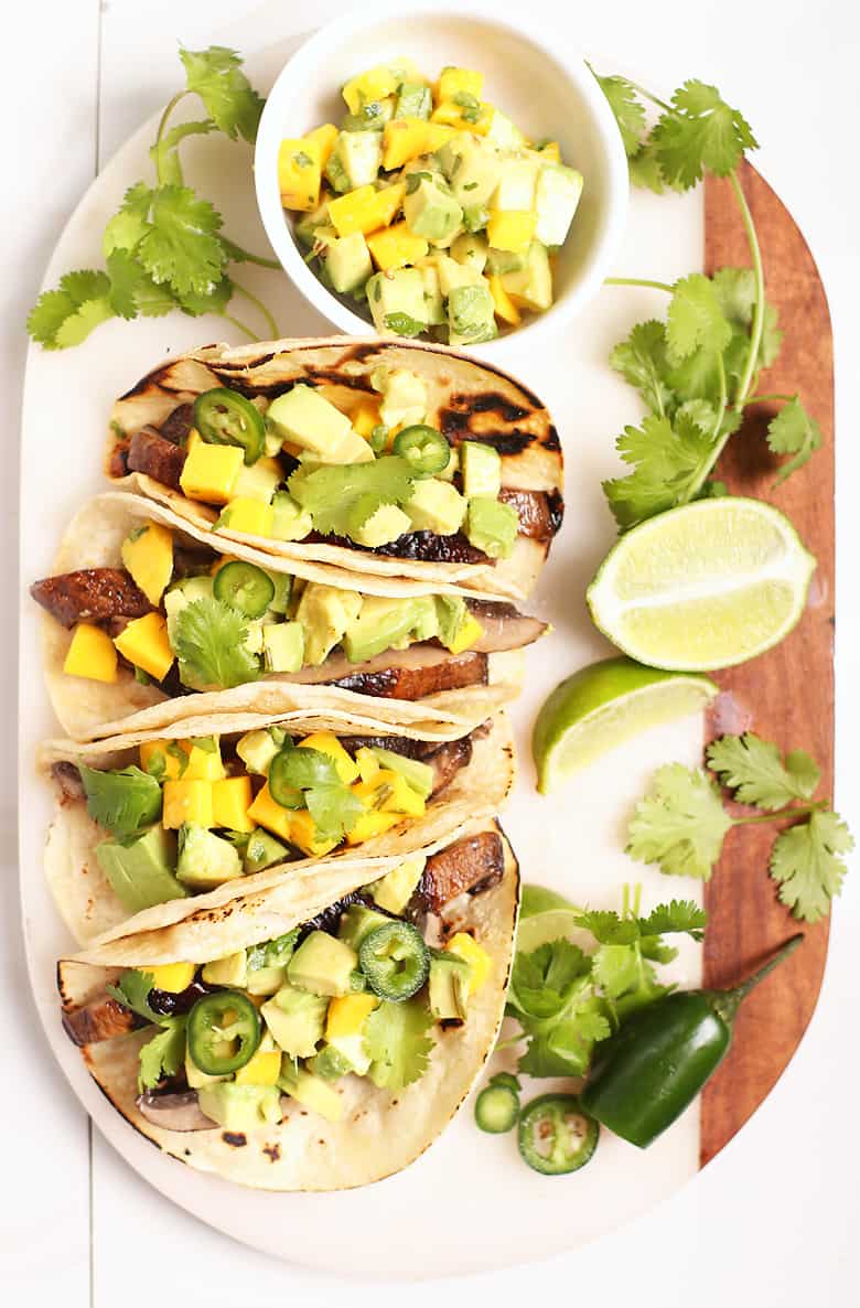 Mushroom tacos on a white board