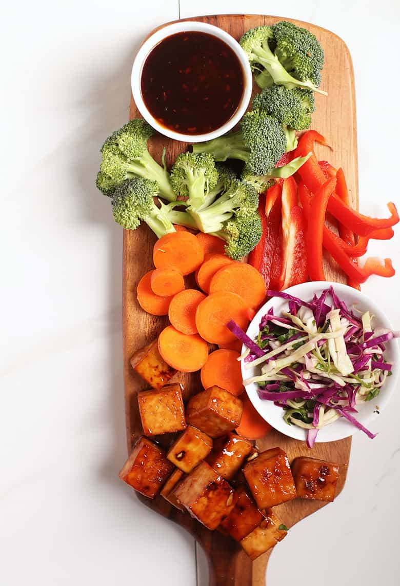 Broccoli, Peppers, and Carrots on cutting board