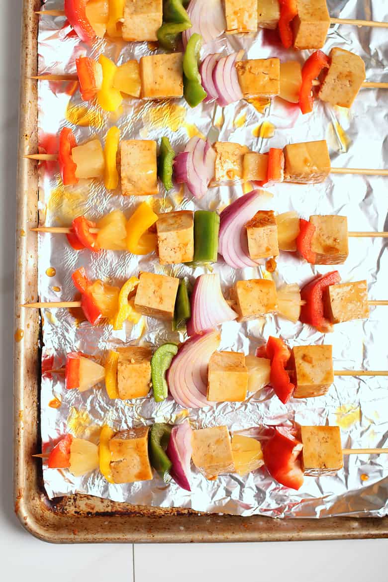 Teriyaki Tofu Skewers on a baking sheet