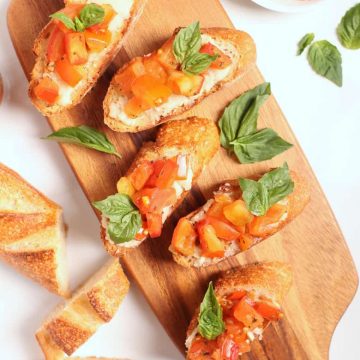 Tomato Bruschetta on a cutting board