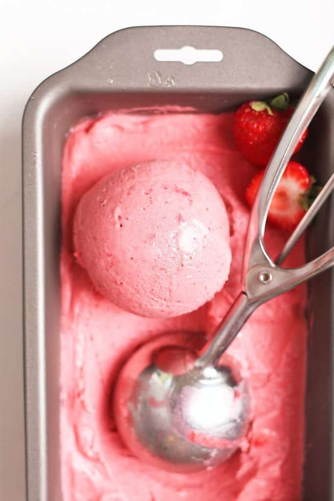 Vegan strawberry ice cream in a loaf pan