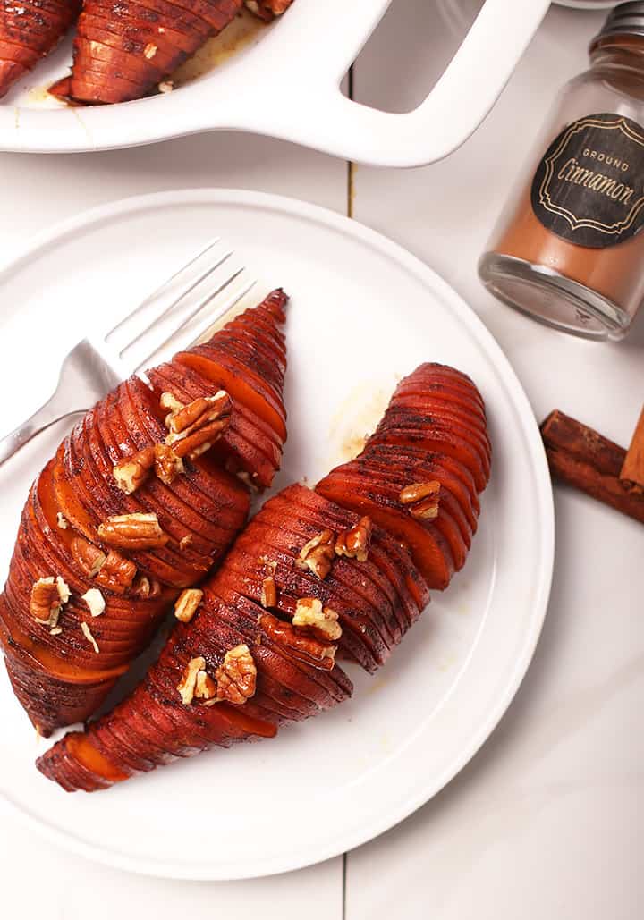 Hasselback Sweet Potatoes on white plate