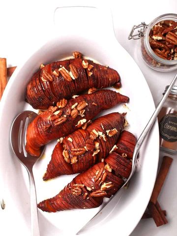 Hasselback sweet potatoes in casserole dish