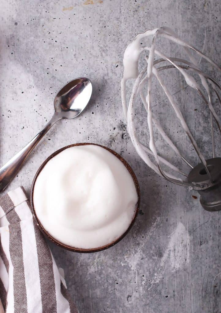 Aquafaba in a small brown bowl