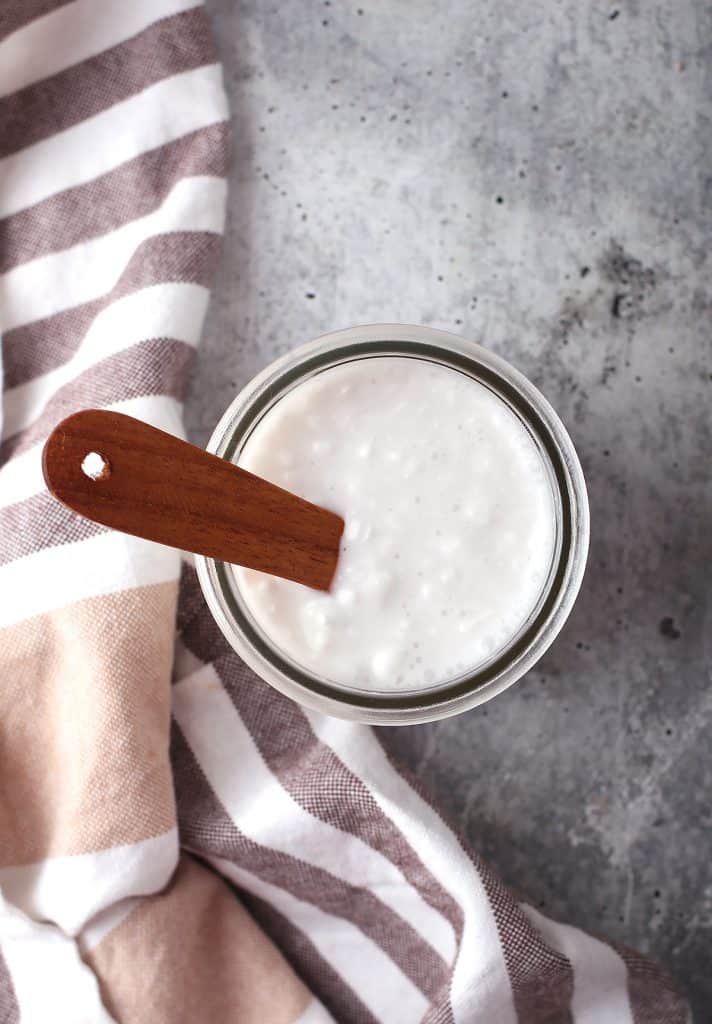 Vegan buttermilk in a small glass jar