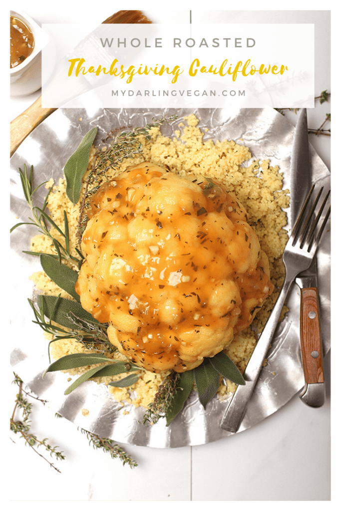 Celebrate the holidays with this festive whole roasted cauliflower. This delicious entrée is slathered and cooked in a sage and oregano spiced gravy and served on a bed of grains or roasted vegetables for the perfect vegan and gluten-free meal. 