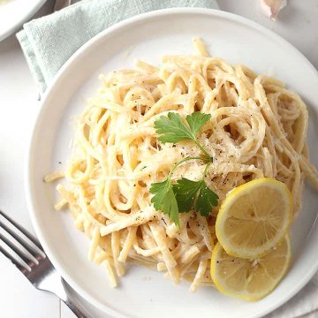 Vegan lemon pasta on white plate