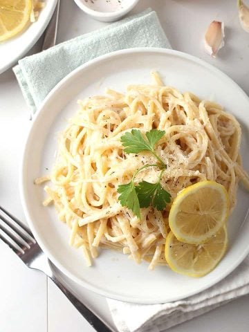 Vegan lemon pasta on white plate