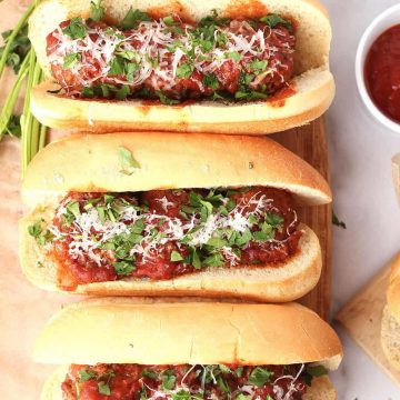 Vegan Meatball Subs on wooden platter