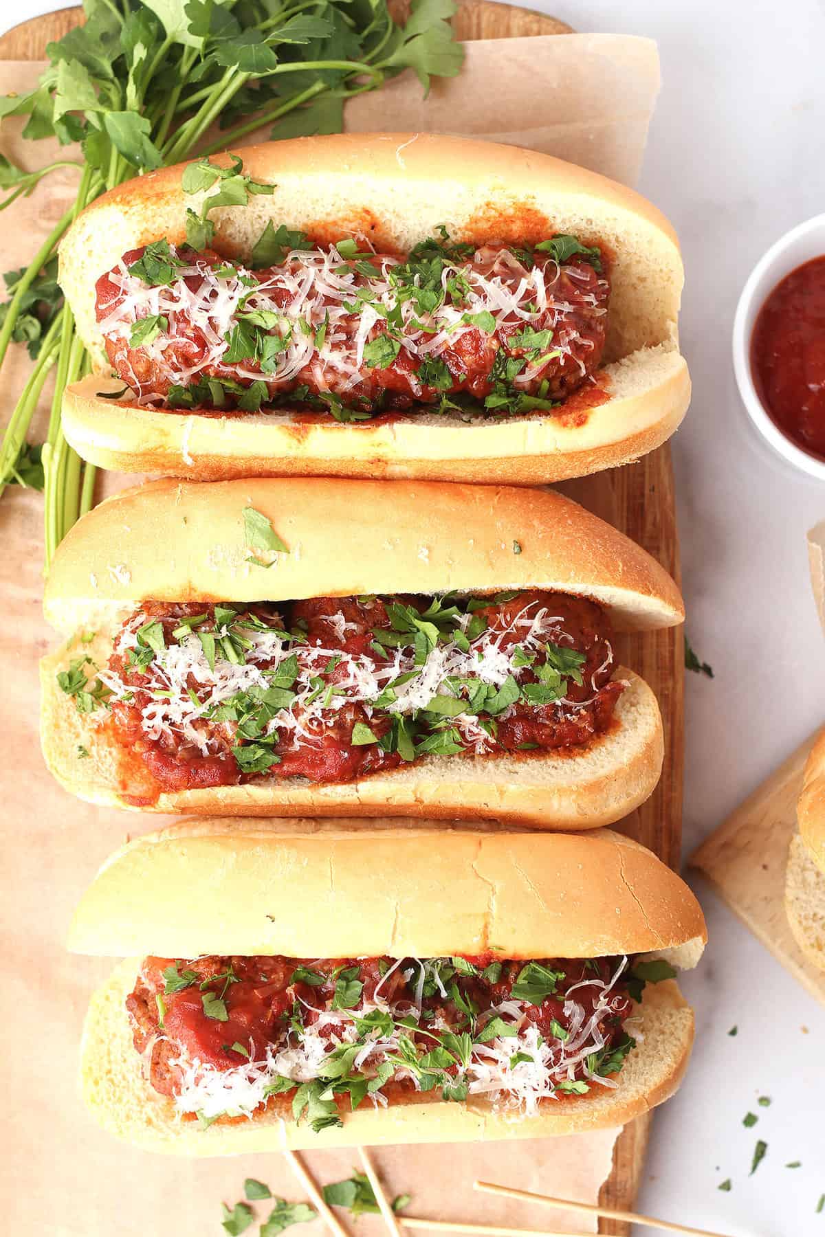 Vegan Meatball Subs on wooden platter