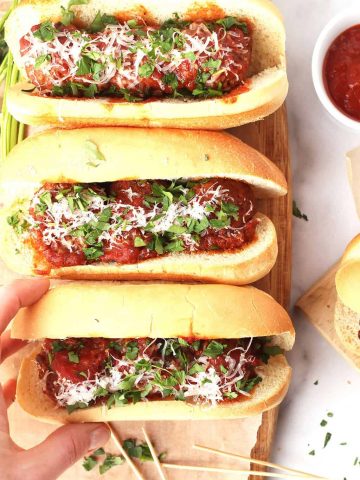 Vegan Meatball Subs on wooden platter