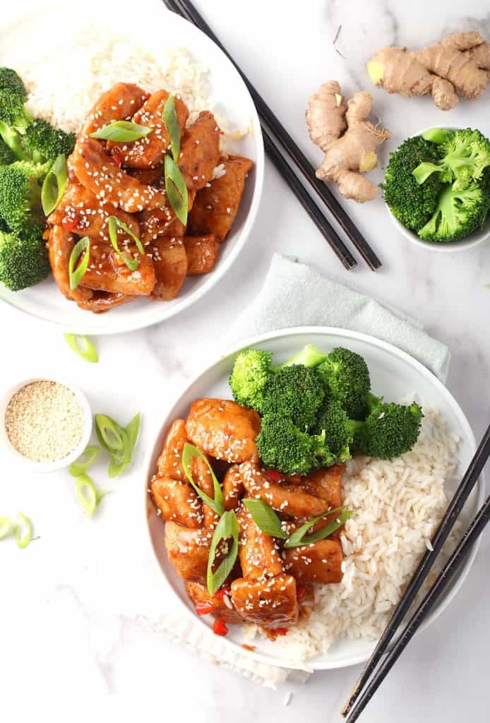 Vegan Mongolian Chicken served onto two white plates