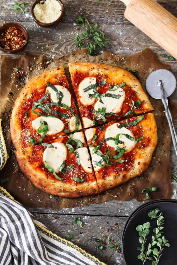 Vegan Margarita Pizza on a cutting board