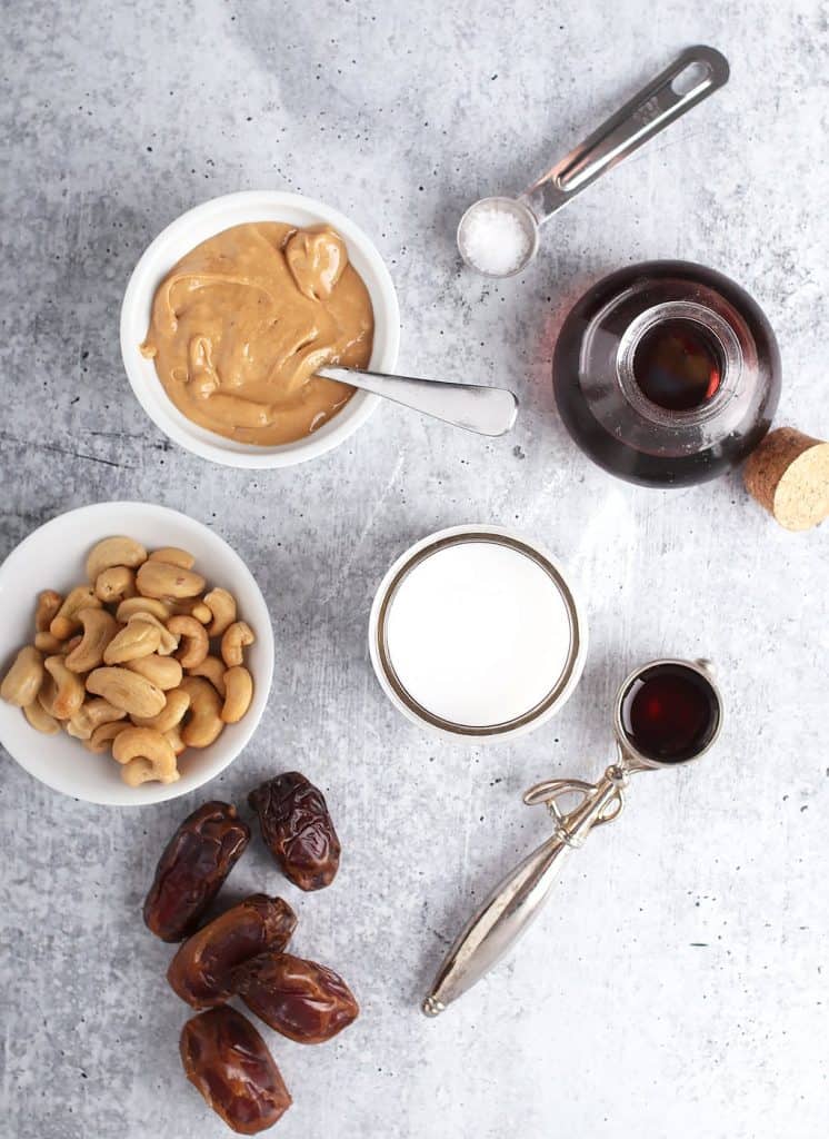 Ingredients for recipe in small bowls on a concrete slab